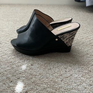 Black leather wedges
